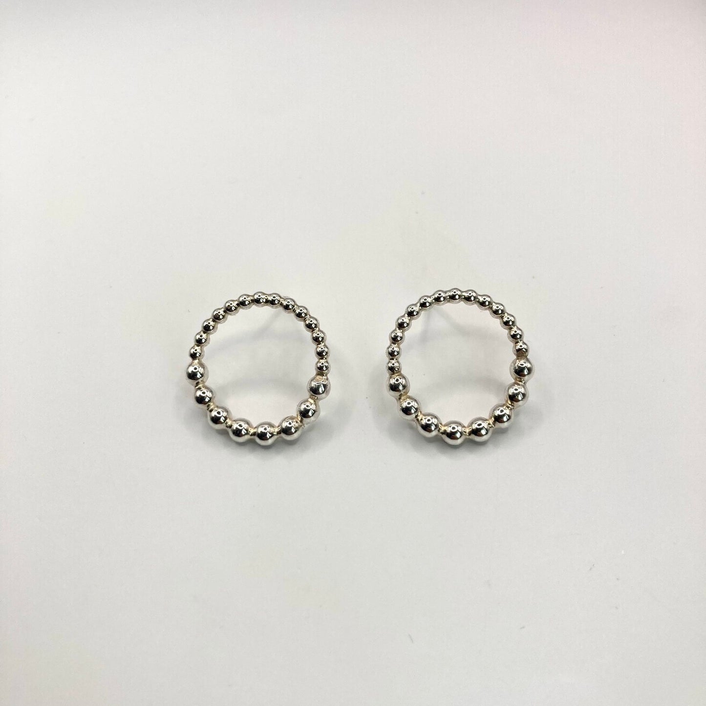 Dotty silver earrings front